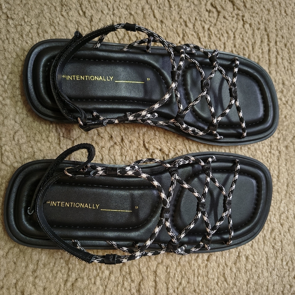 INTENTIONALLY BLANK Lychee Sandal with Black-and-White sport cord elastic straps